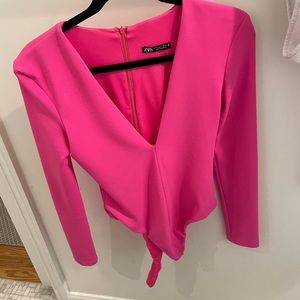 Pink long-sleeve bodysuit